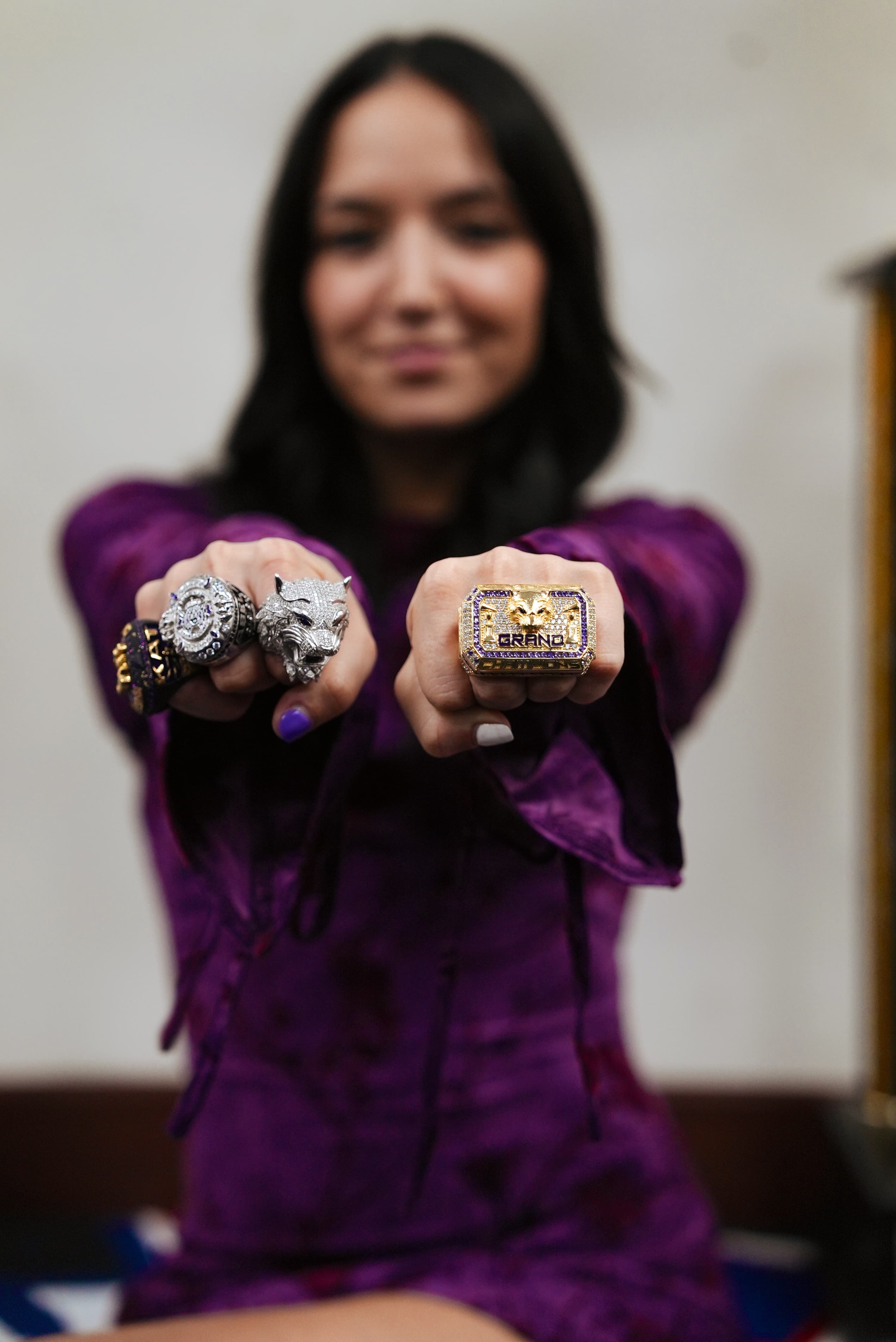 Katherine showing her championship rings